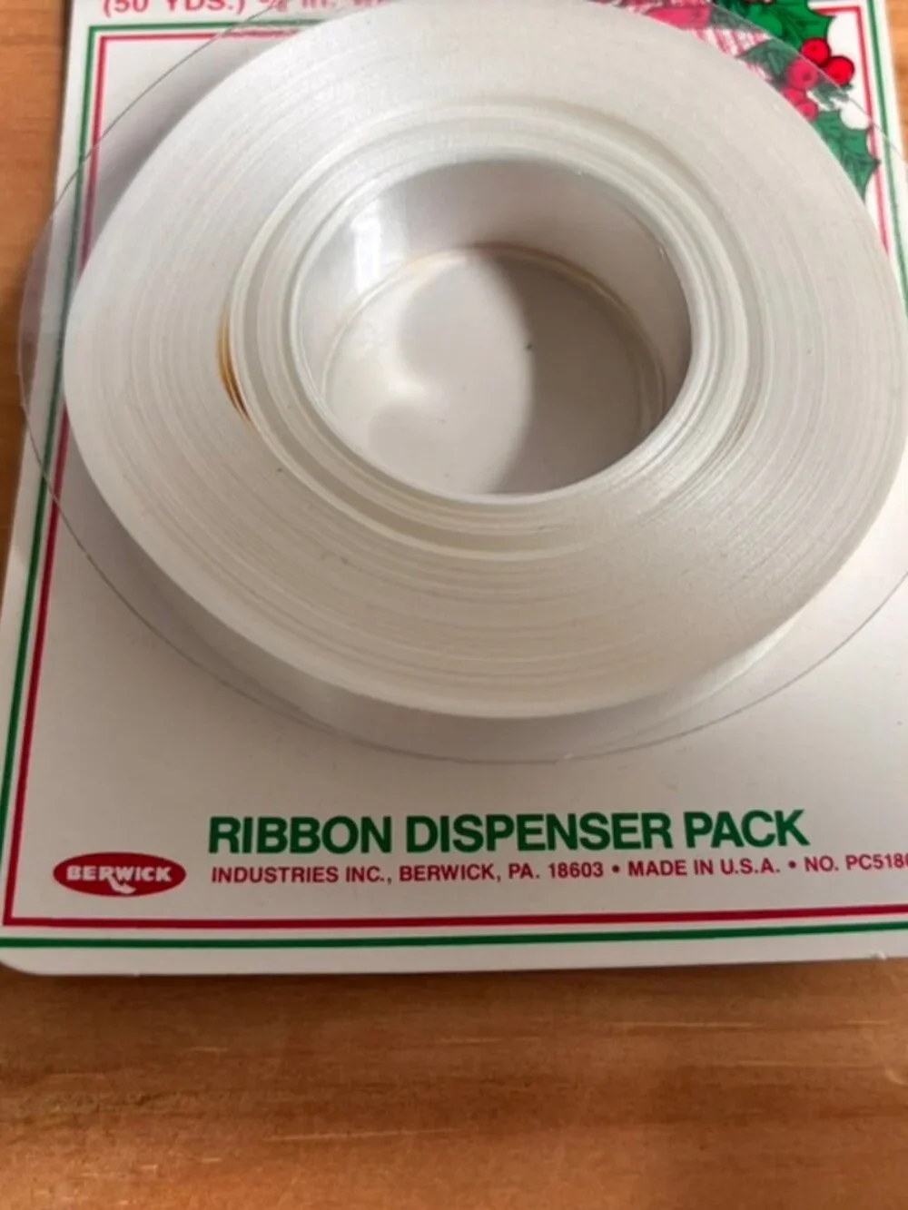 Vintage Berwick Industries 150-foot white decorator ribbon dispenser pack.